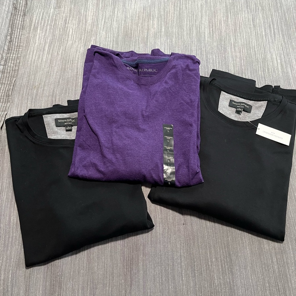 Three Men’s Large Banana Republic long-sleeve shirts. Two w/ tags. Smoke free.